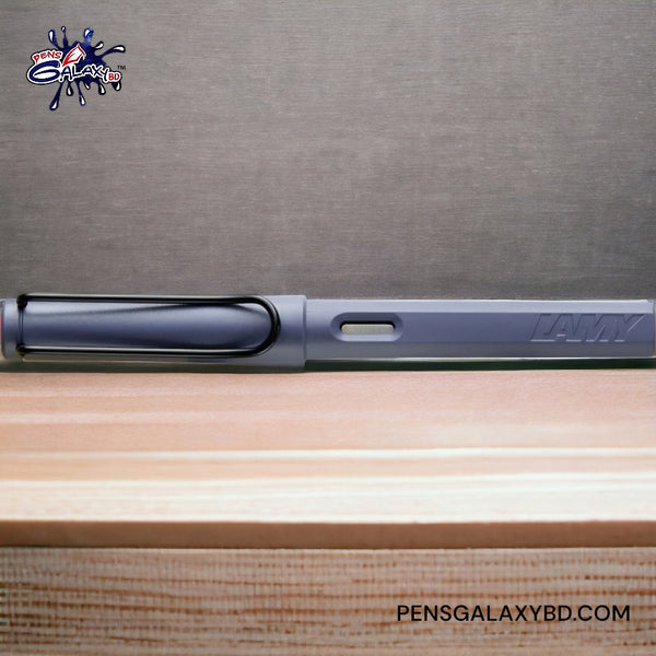 LAMY Safari Fountain Pen - Pink Cliff (special edition) - On a wooden table sideways image