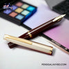 Pilot E95s Fountain Pen - Burgundy/Ivory - on a desk image