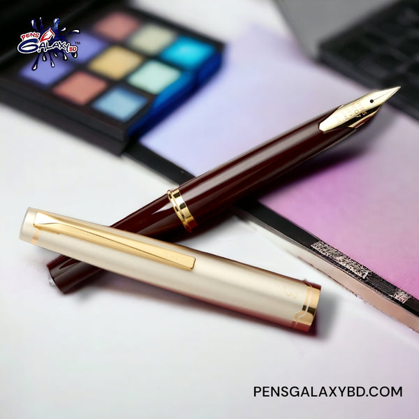 Pilot E95s Fountain Pen - Burgundy/Ivory - on a desk image