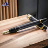 Pilot Custom 823 Fountain Pen in Smoke - On a wooden desk image