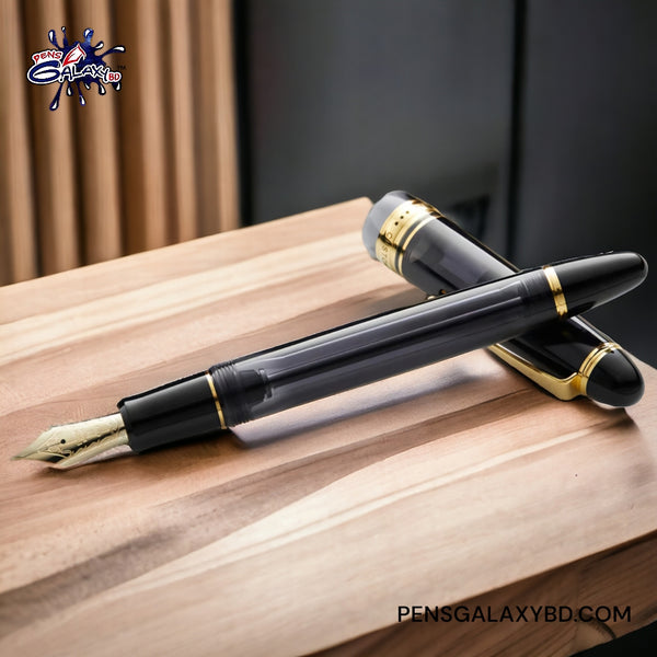 Pilot Custom 823 Fountain Pen in Smoke - On a wooden desk image