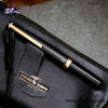Pilot E95s Fountain Pen - Black - On a leather ladies bag image