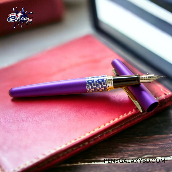 Pilot Metropolitan Fountain Pen - Retro Pop Purple - On a leather diary cover image