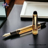 Pilot Custom 823 Fountain Pen in Amber - On a black leather table image