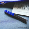 Pilot Kakuno Fountain Pen - Blue/Gray - On a blue surface with a book opened image