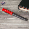 Pilot Kakuno Fountain Pen - Red/Gray - On a wooden desk beside a diary image