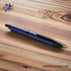 Pilot Vanishing Point Fountain Pen - Matte Blue - On a wooden table - promotional picture image